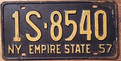 New York 1957 license plate in the 12 by 6 inch standard size