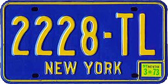 New York license plate from the 1973 design with blue lettering on orange