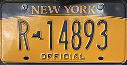 Official New York Empire Gold license plate with dark blue lettering on a gold field